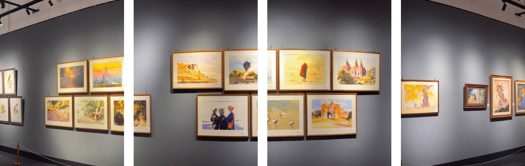 Gallery wall lined with framed artworks
